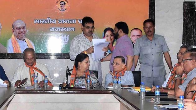 CM Vasundhara Raje and newly appointed party president Madanlal Saini at the first BJP core committee meeting in Jaipur on Monday.(HT Photo)