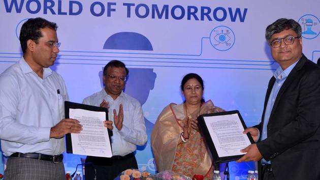 Officials display the MoU signed for digital literacy, in Jaipur on Monday.(HT Photo)