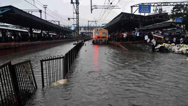 Heavy rains lashed Mumbai and neighbouring areas causing waterlogging and traffic jams at several places. Many trains were stopped and several were running late as rain waters inundated the tracks. (Praful Gangurde / HT Photo) Heavy rains lashed Mumbai and neighbouring areas causing waterlogging and traffic jams at several places. Many trains were stopped and several were running late as rain waters inundated the tracks. (Praful Gangurde / HT Photo)