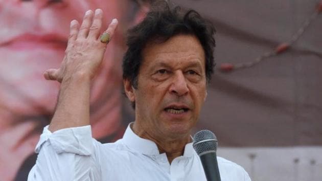Imran Khan, chairman of the Pakistan Tehreek-e-Insaf (PTI), gestures while addressing his supporters during an election rally in Karachi, Pakistan, on July 4, 2018.(Reuters)