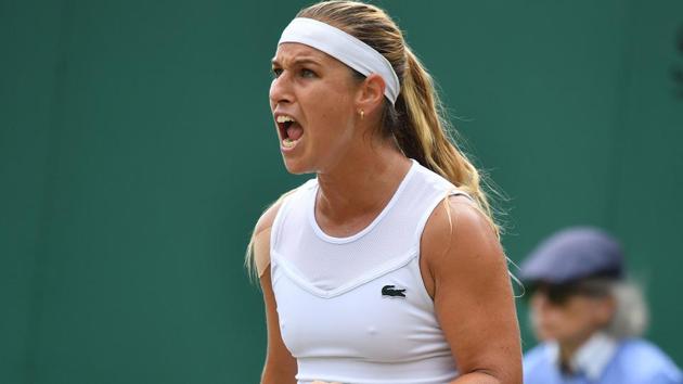 Dominika Cibulkova celebrates a point against Taiwan's Hsieh Su-Wei at the Wimbledon on Tuesday.(AFP)