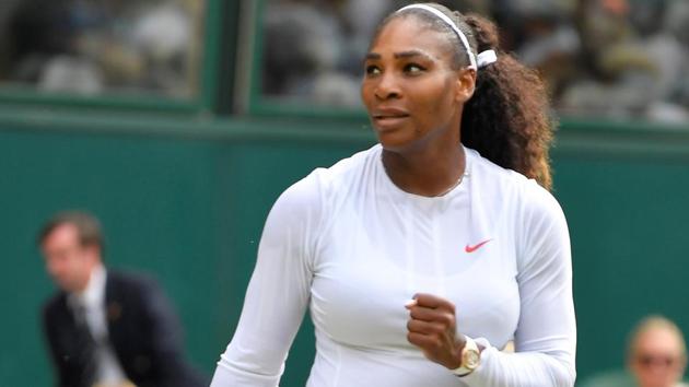 Serena Williams celebrates winning her Wimbledon fourth round match against Russia's Evgeniya Rodina.(REUTERS)