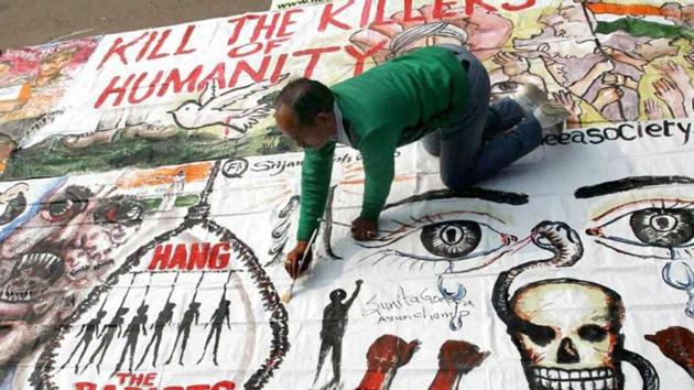 A man makes paintings during a protest at Delhi’s Jantar Mantar against the December 16, 2012, gangrape incident.(PTI File Photo) A man makes paintings during a protest at Delhi’s Jantar Mantar against the December 16, 2012, gangrape incident.(PTI File Photo)
