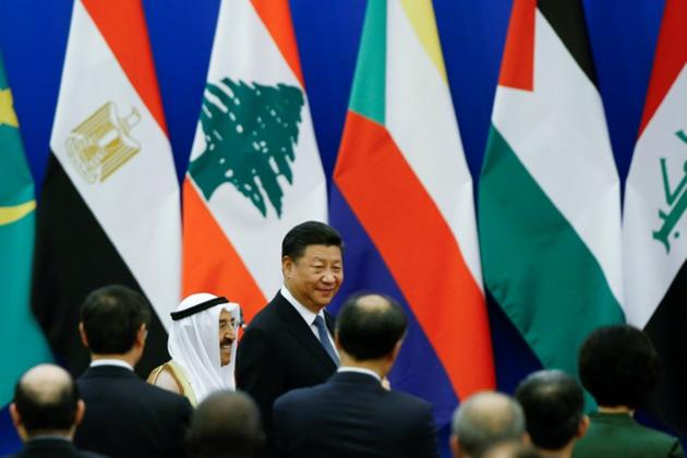 Chinese President Xi Jinping and Kuwait's Emir Sheikh Sabah Al-Ahmad Al- Jaber Al-Sabah arrive at a China Arab forum at the Great Hall of the People in Beijing, China.(Reuters File Photo)