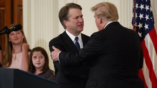 President Donald Trump shakes hands with Brett Kavanaugh, his Supreme Court nominee, in the East Room of the White House, Monday on July 9. (AP Photo) President Donald Trump shakes hands with Brett Kavanaugh, his Supreme Court nominee, in the East Room of the White House, Monday on July 9. (AP Photo)