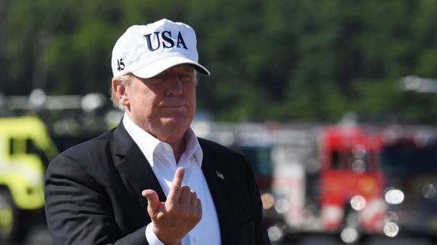 US President Donald Trump confers with the media upon arrival at Morristown Municipal Airport in Morristown, New Jersey.(AFP File Photo)