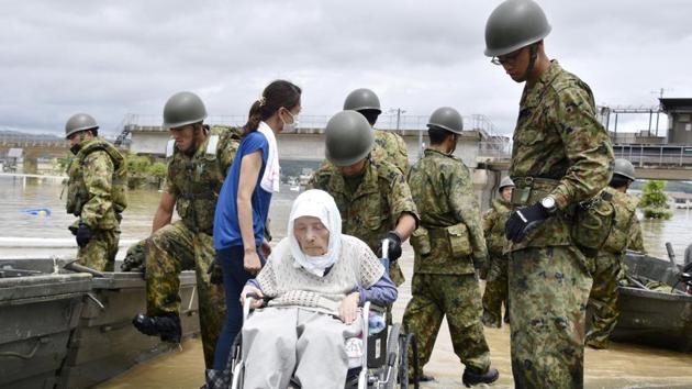 By Tuesday morning, rescue workers were going door-to-door, looking for survivors -- or victims -- of the disaster. “It’s what we call a grid operation, where we are checking every single house to see if there are people still trapped inside them,” an official with the local Okayama prefecture government told AFP. (Kyodo via REUTERS) By Tuesday morning, rescue workers were going door-to-door, looking for survivors -- or victims -- of the disaster. “It’s what we call a grid operation, where we are checking every single house to see if there are people still trapped inside them,” an official with the local Okayama prefecture government told AFP. (Kyodo via REUTERS)