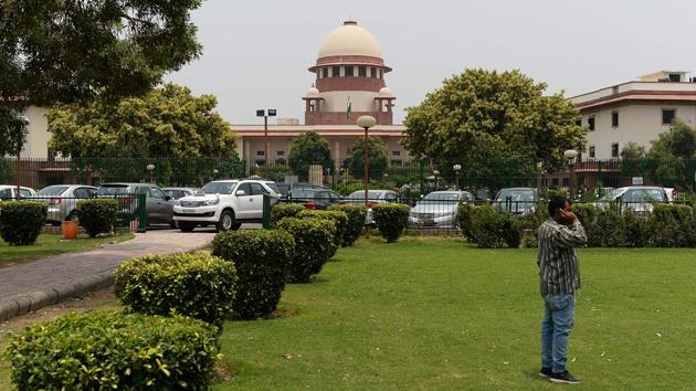 A five-judge Constitution bench headed by Chief Justice Dipak Misra on Tuesday began hearing legal arguments against Section 377. The court said it will examine if the fundamental right to life includes sexual freedom. (Sajjad Hussain / AFP) 