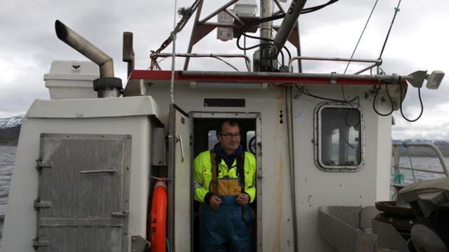 “I don’t get it,” Tommy Pettersen, a 47-year-old Sami fisherman, said on board his boat, which gives him a potentially lucrative but unpredictable income. “We are a maritime nation. We have relied on the ocean to live off and we want to dump this stuff in the fjord?” (Stoyan Nenov / REUTERS)