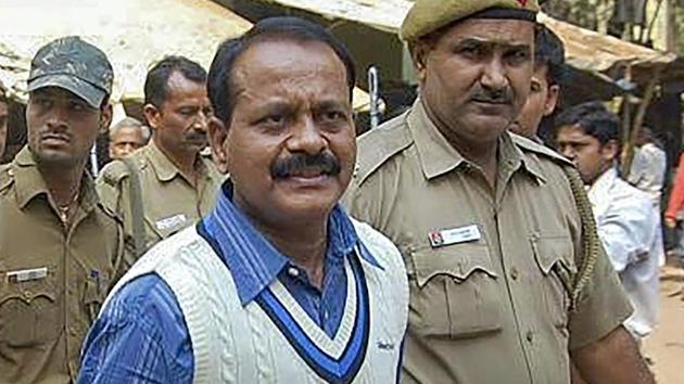 An undated photograph of gangster Munna Bajrangi as he appears for a hearing at a court in Jaunpur,UP. Bajrangi was shot dead in the Baghpat District Jail, allegedly by an inmate, on Monday, July 9, 2018.(PTI)