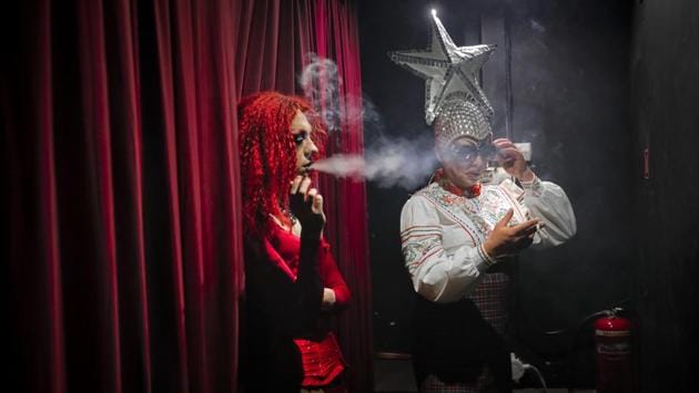 Dmitry, or Africa (L), and Sergey, or Bomba smoke backstage at the Fame gay club. He fears kissing his boyfriend in public, but dreams of one day being able to marry and pleads for more “human understanding” toward people like him. “I understood from my very birth that I’m not like others,” Dmitry said. “You were born heterosexual, and I don’t detest you for that.” (Vadim Ghirda / AP) Dmitry, or Africa (L), and Sergey, or Bomba smoke backstage at the Fame gay club. He fears kissing his boyfriend in public, but dreams of one day being able to marry and pleads for more “human understanding” toward people like him. “I understood from my very birth that I’m not like others,” Dmitry said. “You were born heterosexual, and I don’t detest you for that.” (Vadim Ghirda / AP)