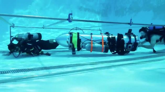 A device by Elon Musk's SpaceX and The Boring Company, designed to help rescue the remaining members of a soccer team trapped in a flooded cave in Chiang Rai, Thailand, is being tested in a swimming pool in Los Angeles, California, US.(Twitter @elonmusk/via REUTERS) A device by Elon Musk's SpaceX and The Boring Company, designed to help rescue the remaining members of a soccer team trapped in a flooded cave in Chiang Rai, Thailand, is being tested in a swimming pool in Los Angeles, California, US.(Twitter @elonmusk/via REUTERS)