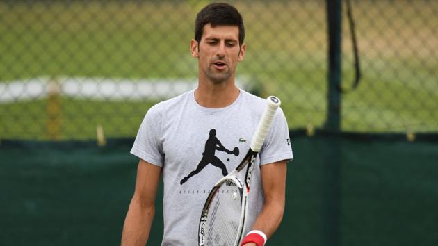 Novak Djokovic practices at the training courts on the eighth day of the 2018 Wimbledon Championships.(AFP)