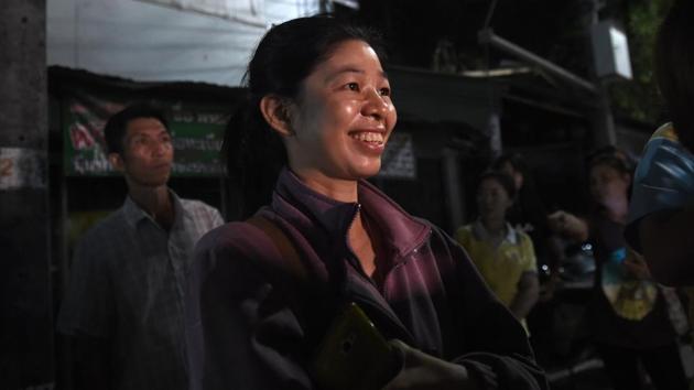 A woman reacts near a hospital where the children's football team members are treated after being rescued, in Chiang Rai.(AFP Photo) A woman reacts near a hospital where the children's football team members are treated after being rescued, in Chiang Rai.(AFP Photo)