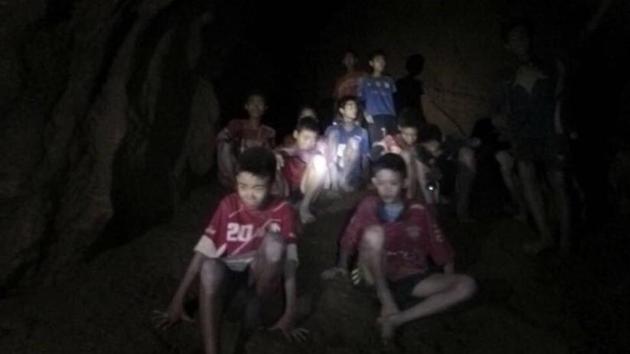 File photo released by Tham Luang Rescue Operation Center shows the boys and their soccer coach as they were found in a partially flooded cave, in Mae Sai, Chiang Rai, Thailand.(AP Photo) File photo released by Tham Luang Rescue Operation Center shows the boys and their soccer coach as they were found in a partially flooded cave, in Mae Sai, Chiang Rai, Thailand.(AP Photo)