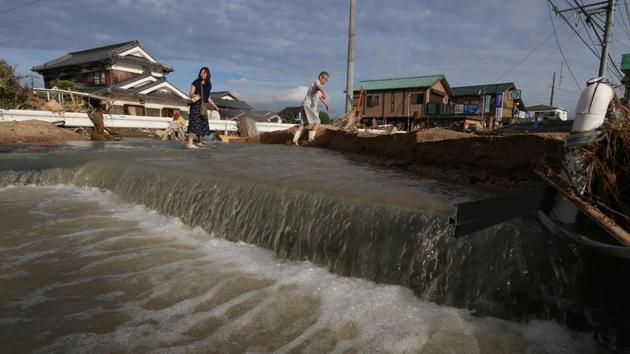 Thousands of people remain in shelters after authorities issued evacuation orders for as many of five million residents, and local authorities in some areas were offering drinking water and bathing services for those in homes without their own supply. (JIJI Press / AFP) Thousands of people remain in shelters after authorities issued evacuation orders for as many of five million residents, and local authorities in some areas were offering drinking water and bathing services for those in homes without their own supply. (JIJI Press / AFP)