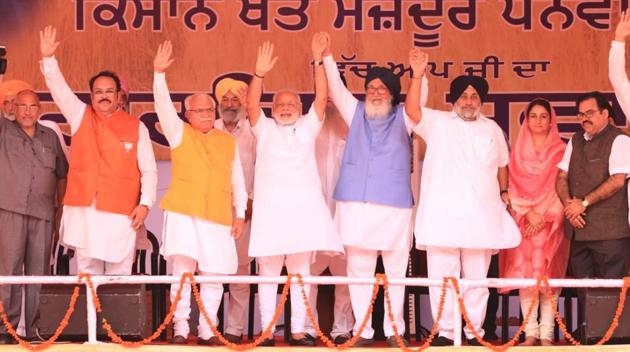 Prime Minister Narendra Modi with other leaders at a farmers’ rally in Malout in Punjab. The rally was held to mark the “unprecedented” increase in Minimum Support Price (MSP) for Kharif crops announced by the Centre recently. (Sanjeev Kumar/HT photo) Prime Minister Narendra Modi with other leaders at a farmers’ rally in Malout in Punjab. The rally was held to mark the “unprecedented” increase in Minimum Support Price (MSP) for Kharif crops announced by the Centre recently. (Sanjeev Kumar/HT photo)