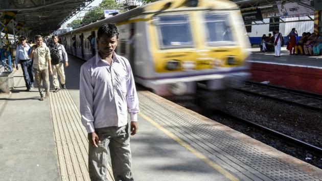 A series of blasts ripped through packed Mumbai local trains on July 11, 2006, killing 188 people and wounding over 800. Kamlesh Rajbhar, 32, was one of them. 12 years since Rajbhar lost both his legs in the 7/11 terror blast, he revisited the city of dreams once again-- to stand back. (Kunal Patil / HT Photo)