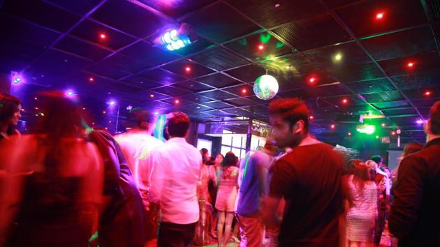 Single women are being denied entry into pubs and nightclubs on MG Road in Gurugram after the police conducted raids in the area on July 3 to check alleged solicitation and immoral trafficking.(Shivam Saxena/HT)