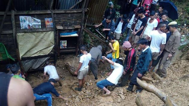 Recovery efforts to rescue people caught in a deadly landslide that hit a remote area in Manipur's Tamenglong district.(AFP) Recovery efforts to rescue people caught in a deadly landslide that hit a remote area in Manipur's Tamenglong district.(AFP)