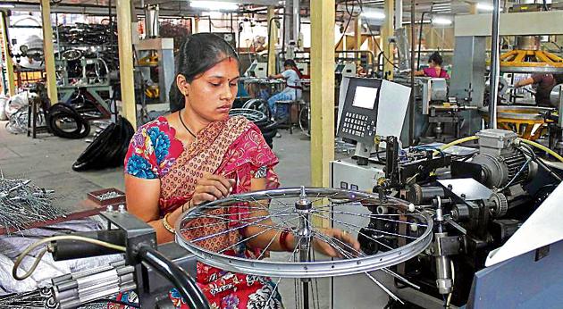 A worker at a cycle factory in Ludhiana. Punjab did not figure among top five states in any of the 12 reform areas. (HT Photo) A worker at a cycle factory in Ludhiana. Punjab did not figure among top five states in any of the 12 reform areas. (HT Photo)