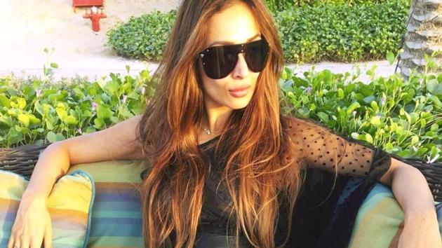 Malaika Arora shows how to rock overalls like an adult with her latest airport look. (Instagram)