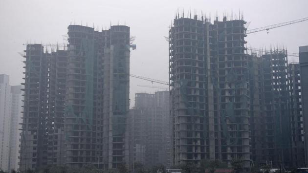 A view of an under-construction building in Noida. The district administration has proposed to keep circle rates unchanged for homebuyers as well as commercial buyers.(Sunil Ghosh/ HT File)