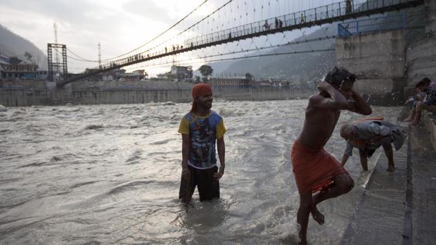 In this photograph taken on July 11, 2018, Hindu devotees bathe in the Bhagiathi River in Uttarkashi, in Uttarakhand. (AFP) In this photograph taken on July 11, 2018, Hindu devotees bathe in the Bhagiathi River in Uttarkashi, in Uttarakhand. (AFP)