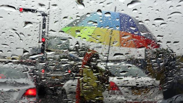Rain drops are seen on the window of a car as a woman sells umbrellas at a traffic intersection in Hyderabad. Heavy to very heavy rain is expected to hit isolated parts of Uttar Pradesh, Uttarakhand, east Rajasthan, Madhya Pradesh, coastal Andhra Pradesh, Telangana, coastal & south interior Karnataka and Kerala. (Mahesh Kumar A / AP) Rain drops are seen on the window of a car as a woman sells umbrellas at a traffic intersection in Hyderabad. Heavy to very heavy rain is expected to hit isolated parts of Uttar Pradesh, Uttarakhand, east Rajasthan, Madhya Pradesh, coastal Andhra Pradesh, Telangana, coastal & south interior Karnataka and Kerala. (Mahesh Kumar A / AP)