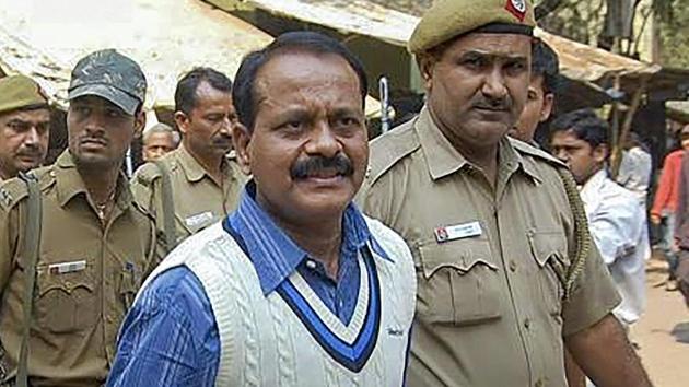 An undated photograph of gangster Munna Bajrangi as he appears for a hearing at a court in Jaunpur,UP. Bajrangi was shot dead in the Baghpat District Jail, allegedly by murder convict Sunil Rathi on July 9, 2018.(PTI File)