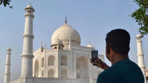 Photography will be allowed in all of the monuments and archaeological sites administered by the ASI, except the mausoleum at Taj Mahal, the Ajanta Caves and the Leh Palace.(PTI file photo)