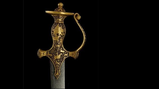 Maharaja Ranjit Singh on a Sikh sword. The guard of the hilt, which shows the Sikh king riding an elephant, is inscribed with the tenth Sikh Guru’s philosophy on the nature of kingship: ‘May the cauldron and sword flourish in the world. Grant your protection so that no other may kill me’. (Toor collection)
