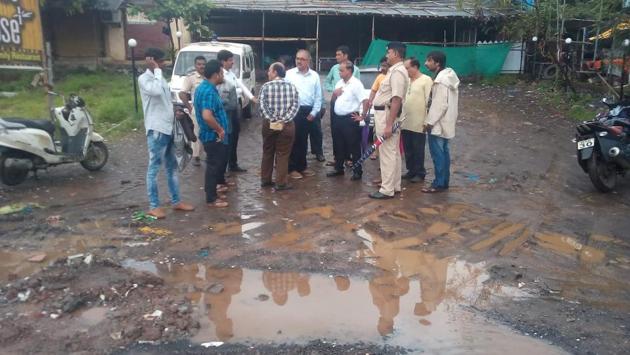 A 26-year-old man was crushed to death by a truck after he fell off his two-wheeler that tripped on a pothole in Maharashtra’s Kalyan on Friday, police said, in the fifth such incident since the monsoon set in the state. “He died on the spot. The truck driver fled away immediately after the incident,” an officer of the Khadakpada police station said. (Rishikesh Chowdury / HT Photo)