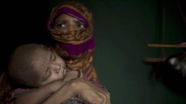 For some rape survivors, the idea of giving birth to a child conceived by someone other than a Muslim felt like a fate worse than death. So they turned to clinics and makeshift pharmacies set up in the camps for abortion drugs they hoped could end their agony. (Wong Maye-E / AP)