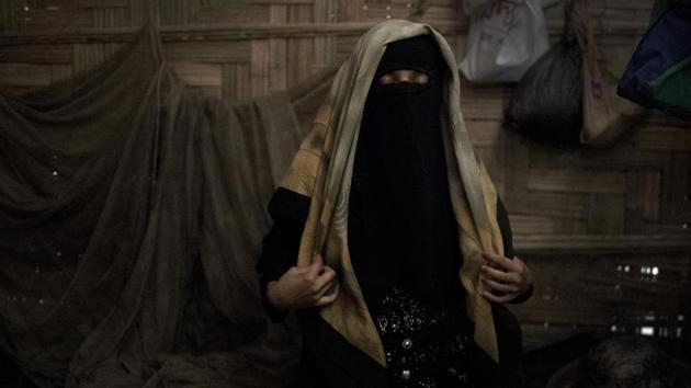 The moment “A” feared arrived one day in May. She labored on the floor of her shelter, her mother and grandmother by her side. Her father hurried to a clinic and asked them to take the baby away. An hour after A gave birth, an aid worker retrieved the infant. “Even though I got this baby from the Buddhists, I love her,” she said. “Because I carried her for nine months.” (Wong Maye-E / AP)