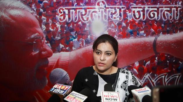 Monika Bhagat, wife of BJP MLA Gagan Bhagat, addresses the media on the issue of an alleged abducting of a college girl by her husband, in Jammu on Friday.(PTI Photo)