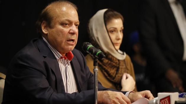 Ousted Pakistani prime minister Nawaz Sharif and his daughter Maryam Nawaz attend a UK PMLN Party Workers Convention meeting with supporters in London on July 11, 2018.(AFP/Tolga Akmen)