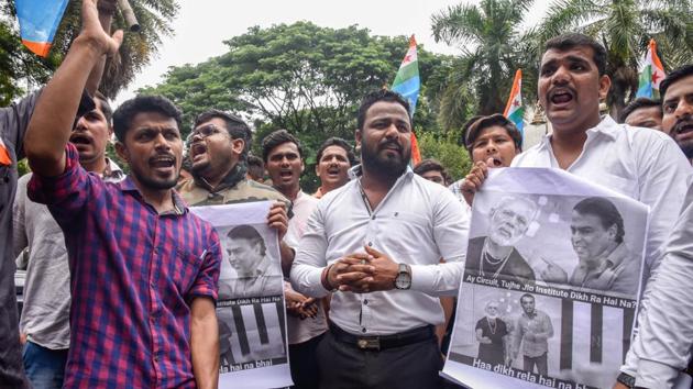 Members of NSUI protest outside Prakash Javdekar's home in Kothrud after he declared Jio Institute as institute of eminence in Pune on July 12, 2018. (Sanket Wankhade/HT PHOTO) Members of NSUI protest outside Prakash Javdekar's home in Kothrud after he declared Jio Institute as institute of eminence in Pune on July 12, 2018. (Sanket Wankhade/HT PHOTO)