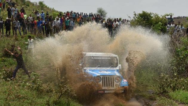 A vehicle races through a mud track during state level Bhopal mud challenge car rally, organised by Royal youth group in the Bhaunri village near Bhopal on July 8, 2018. (Mujeeb Faruqui / HT Photo) A vehicle races through a mud track during state level Bhopal mud challenge car rally, organised by Royal youth group in the Bhaunri village near Bhopal on July 8, 2018. (Mujeeb Faruqui / HT Photo)