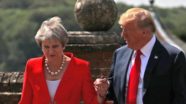 Britain's Prime Minister Theresa May and US President Donald Trump walk to a joint news conference at Chequers, the official country residence of the Prime Minister, near Aylesbury, Britain. (Reuters Photo) Britain's Prime Minister Theresa May and US President Donald Trump walk to a joint news conference at Chequers, the official country residence of the Prime Minister, near Aylesbury, Britain. (Reuters Photo)