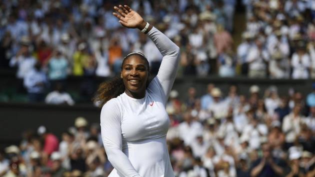 Serena Williams celebrates after beating Julia Goerges 6-2, 6-4 in their Wimbledon women's singles semi-final match.(AFP)