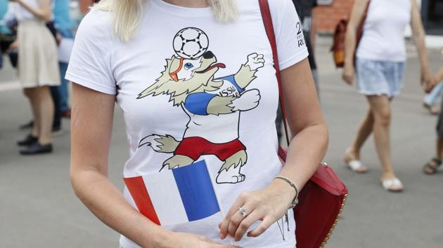 An image of the official mascot for the FIFA World Cup, Zabivaka, is seen on a T-shirt of a woman, who attends the Day of France event, part of celebrations in honour of Bastille Day, in Moscow. (REUTERS)
