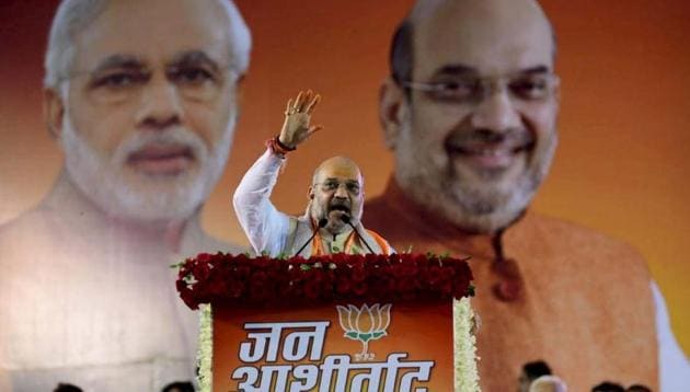 BJP National President Amit Shah addresses during 'Jan Ashirwad Yatra', in Ujjain, on Saturday, July 14, 2018. (PTI Photo) BJP National President Amit Shah addresses during 'Jan Ashirwad Yatra', in Ujjain, on Saturday, July 14, 2018. (PTI Photo)