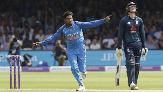 India's Kuldeep Yadav celebrates taking the wicket of England's Jonny Bairstow. (AP)