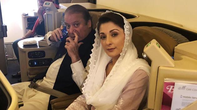 Ousted Pakistani Prime Minister Nawaz Sharif and his daughter Maryam on the Lahore-bound flight at Abu Dhabi International Airport, UAE. on July 13, 2018. The duo were arrested on the flight in Lahore and taken to jail under tight security.(Reuters)