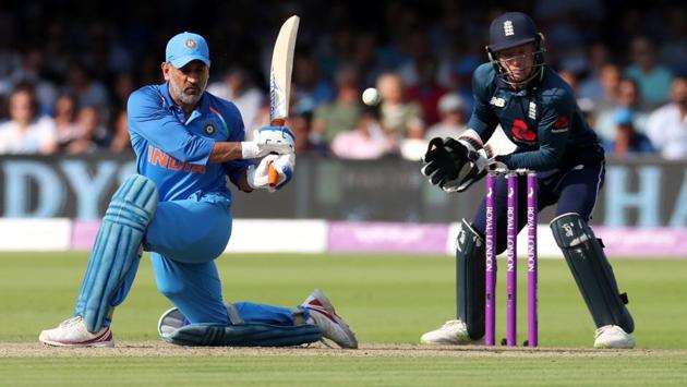 India's MS Dhoni in action playing without a helmet as England's Jos Buttler looks on. (REUTERS)