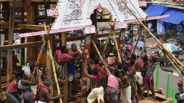 On the day of the yatra, many of the sevaks who build the raths may have no role to play and the sevaks don’t seem to mind. “When we (the main sevaks whose names are on the temple records) die, fire from the akhanda jyoti that burns before the mahabprabhu will be brought to light our funeral pyres,” says Purnachandra, eyes bright with the hope of reward in the other world. (Raj K Raj / HT Photo)