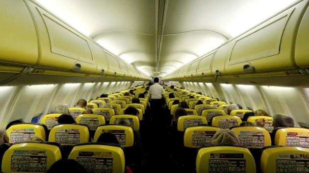A cabin crew member serves passengers onboard a Ryanair passenger aircraft travelling from Madrid International Airport to Bergamo Airport, Italy, January 13, 2018.(Reuters File Photo)