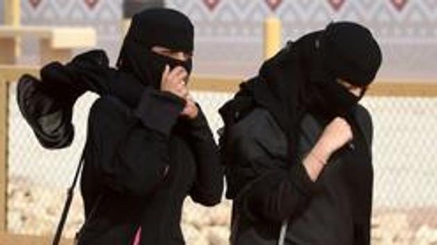 A picture taken on January 19, 2018 shows Saudi women walking during the King Abdulaziz Camel Festival in Rumah, some 160 kilometres east of Riyadh.(AFP Representative Photo)