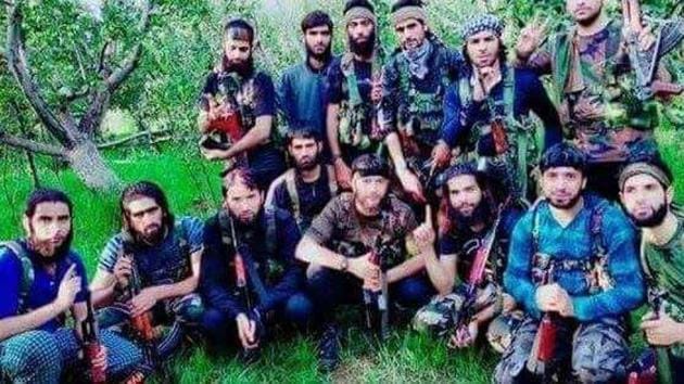 In a new photo, 14 young men are seen mostly wearing blue amid a green background - probably an orchard or a forest area.(Facebook) In a new photo, 14 young men are seen mostly wearing blue amid a green background - probably an orchard or a forest area.(Facebook)